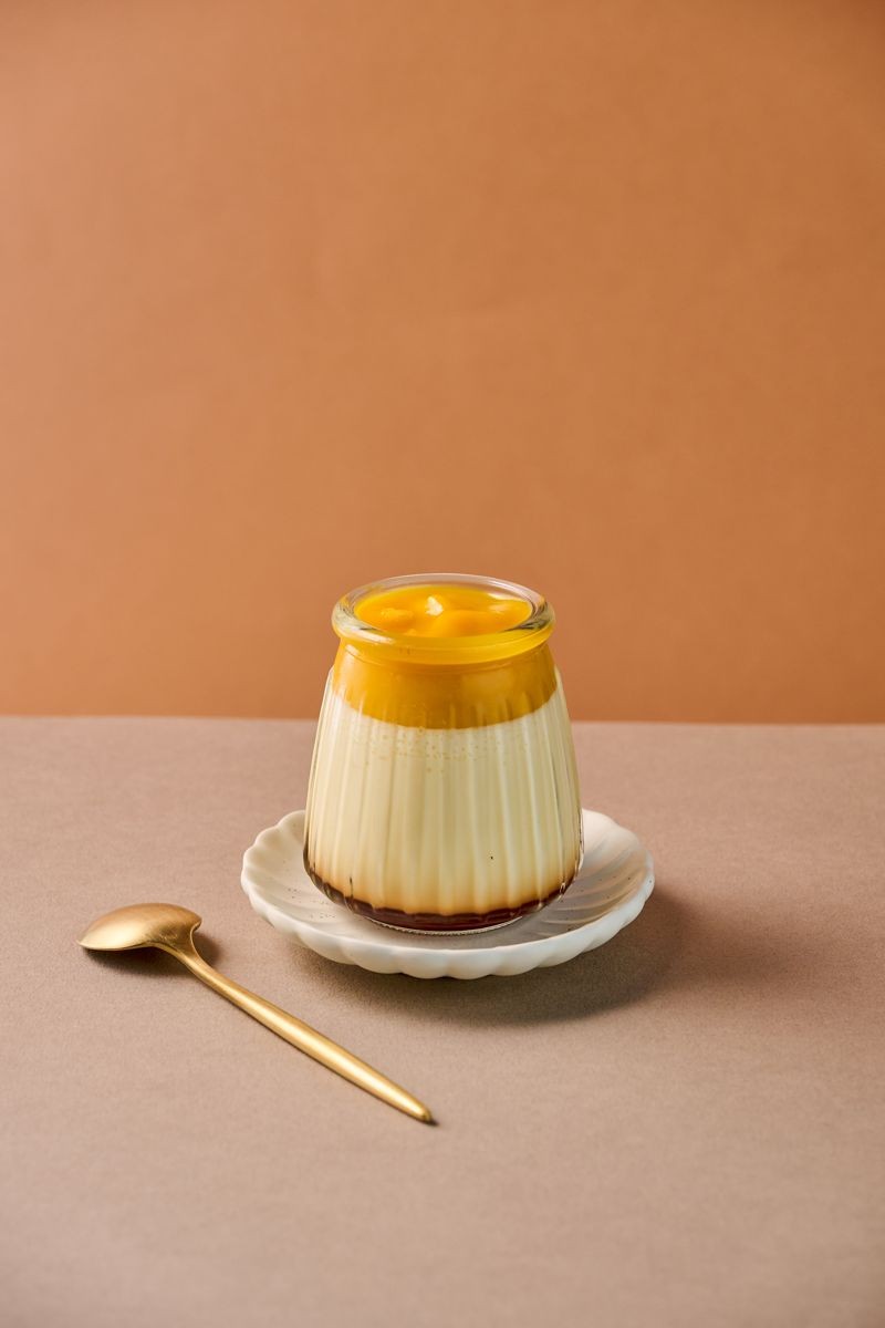 經典布丁改良後的「昭和芒果」更酸甜清爽。(90元/個)(金田屋・日本大福專賣提供)