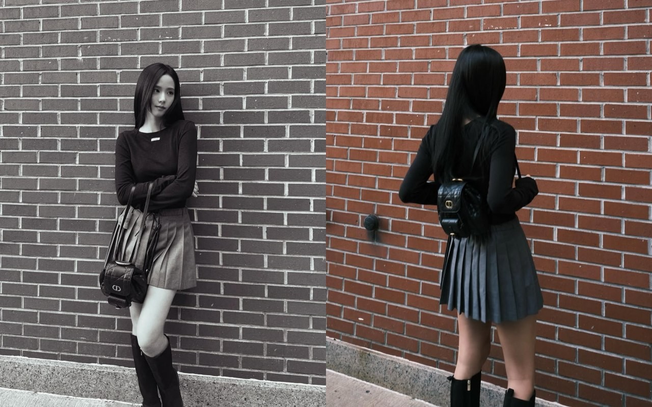 身為 Dior 品牌大使,Jisoo 擁有各式包款。細看她的街拍不難發現,她偏好將背帶調短:無論肩背或斜背,都讓包款貼近上身,不僅視覺更輕盈俏麗,也能抬高腰線、拉長腿部線條。