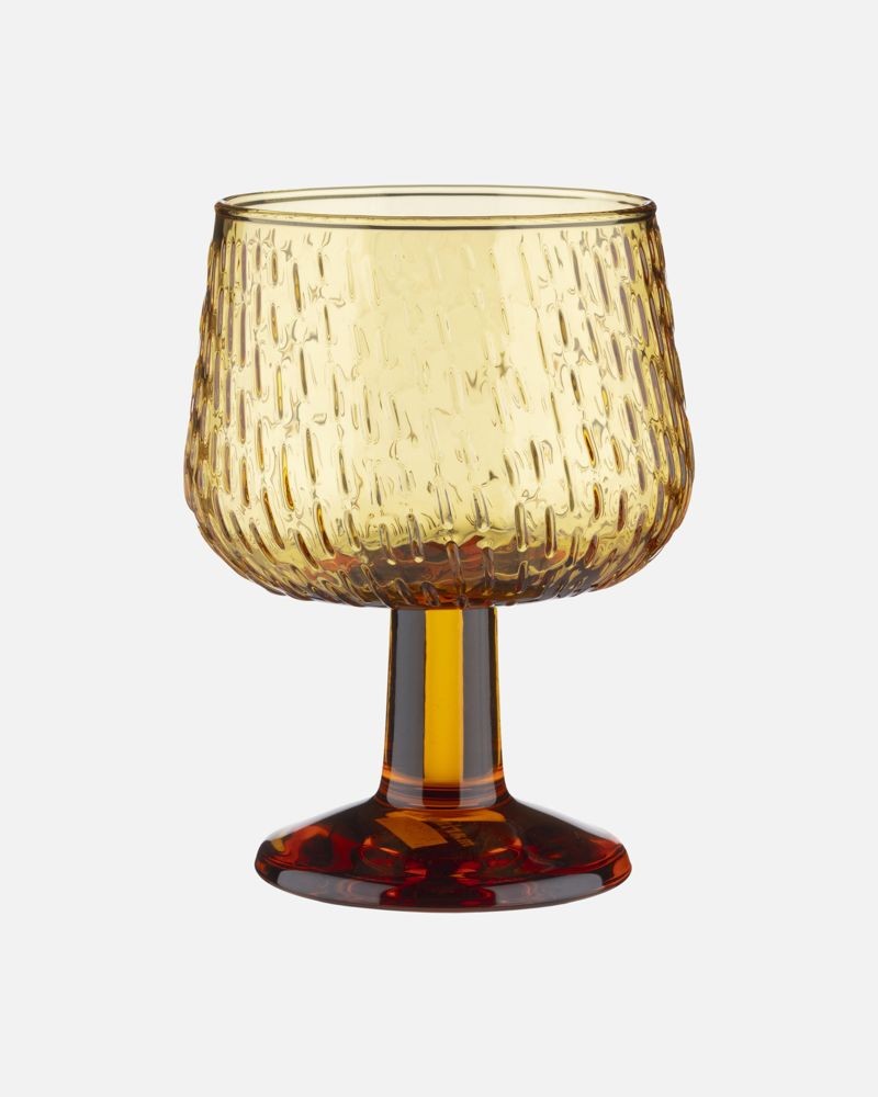 Marimekko Syksy玻璃系列琥珀金雨滴觸感高腳玻璃杯(250ml)。NT$1,790(俊思提供)