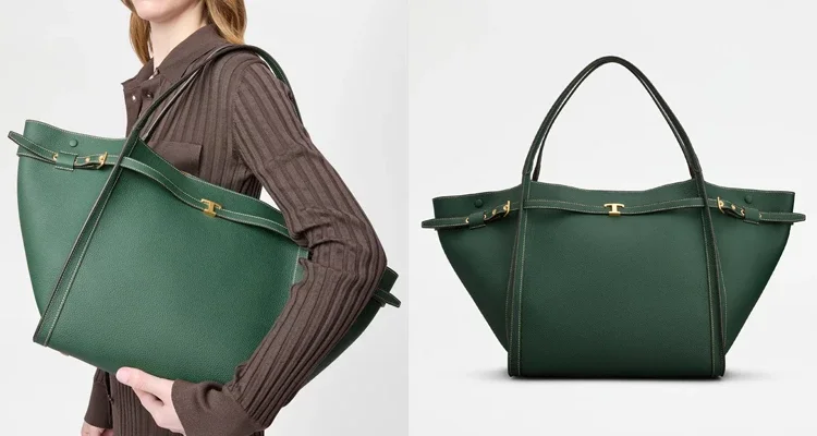 如果你想要一咖充滿活力的亮色大包,Tod's這款濃郁的綠色「T Signature」托特包,絕對會擊中你的喜好。優雅的雙翼包型,可以透過兩側皮革釦帶微調,低調的T字金屬釦飾點綴其間,義大利工匠的頂級皮革工藝,則在包身上展現得淋漓盡致。但也因為包包的顏色本身就非常亮眼了,所以建議身上的穿搭,可以走極簡路線來襯托。例如用一條深色牛仔褲、一件經典的卡其色風衣或純白襯衫...讓這款森林綠托特包,成為全身上下最亮眼的視覺焦點。(商品價格約:NTD 95,100)