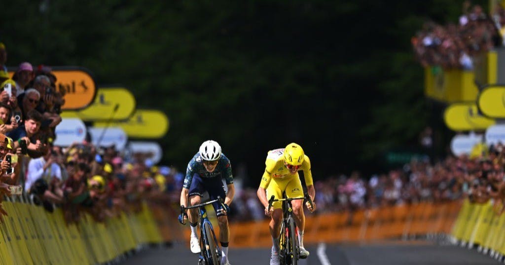 LE-LIORAN, FRANCE - JULY 10: (L-R) Jonas Vingegaard Hansen of Denmark and Team Visma | Lease a Bike and Tadej Pogacar of Slovenia and UAE Team Emirates - Yellow Leader Jersey sprint at finish line to win the stage during the 111th Tour de France 2024, Stage 11 a 211km stage from Evaux-les-Bains to Le Lioran (1239m) / #UCIWT / on July 10, 2024 in Le Lioran, France. (Photo by Dario Belingheri/Getty Images)