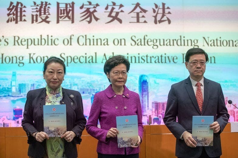 特區政府表態支持國安法，並非由林鄭一人總括代表，律政司司長以及保安局暨各紀律部隊首長亦分別表態。（亞新社）
