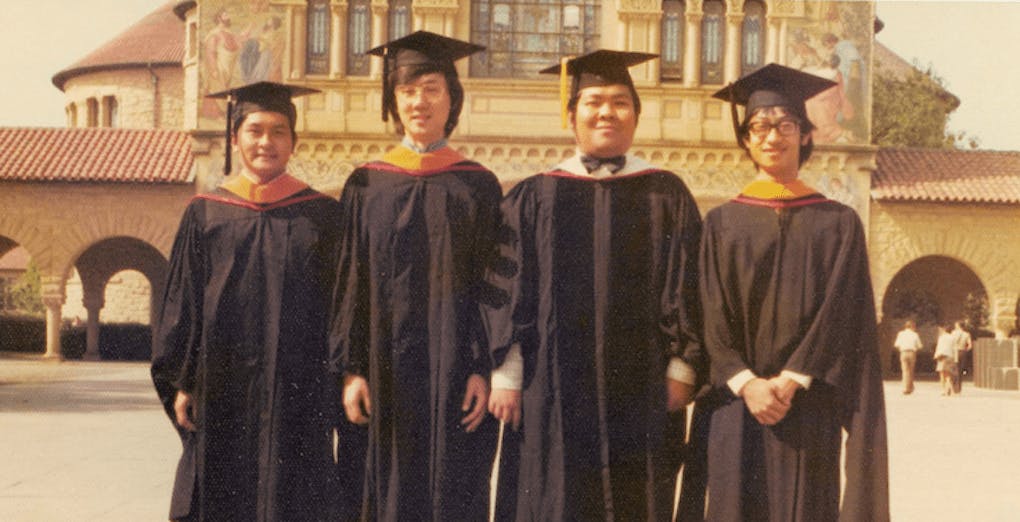 Ming Chan (second from the right) taking PhD graduation photo at Stanford.