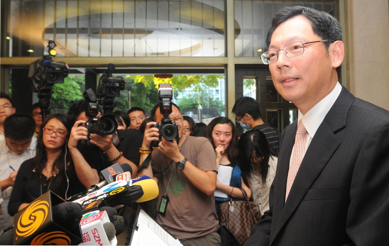 陳德霖指港美息差擴闊，觸發資金外流。（亞新社圖片）