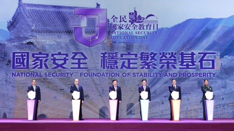 夏寶龍（中）在港的公開講話，直指維護國家安全是第一要務。（李家超Facebook圖片）