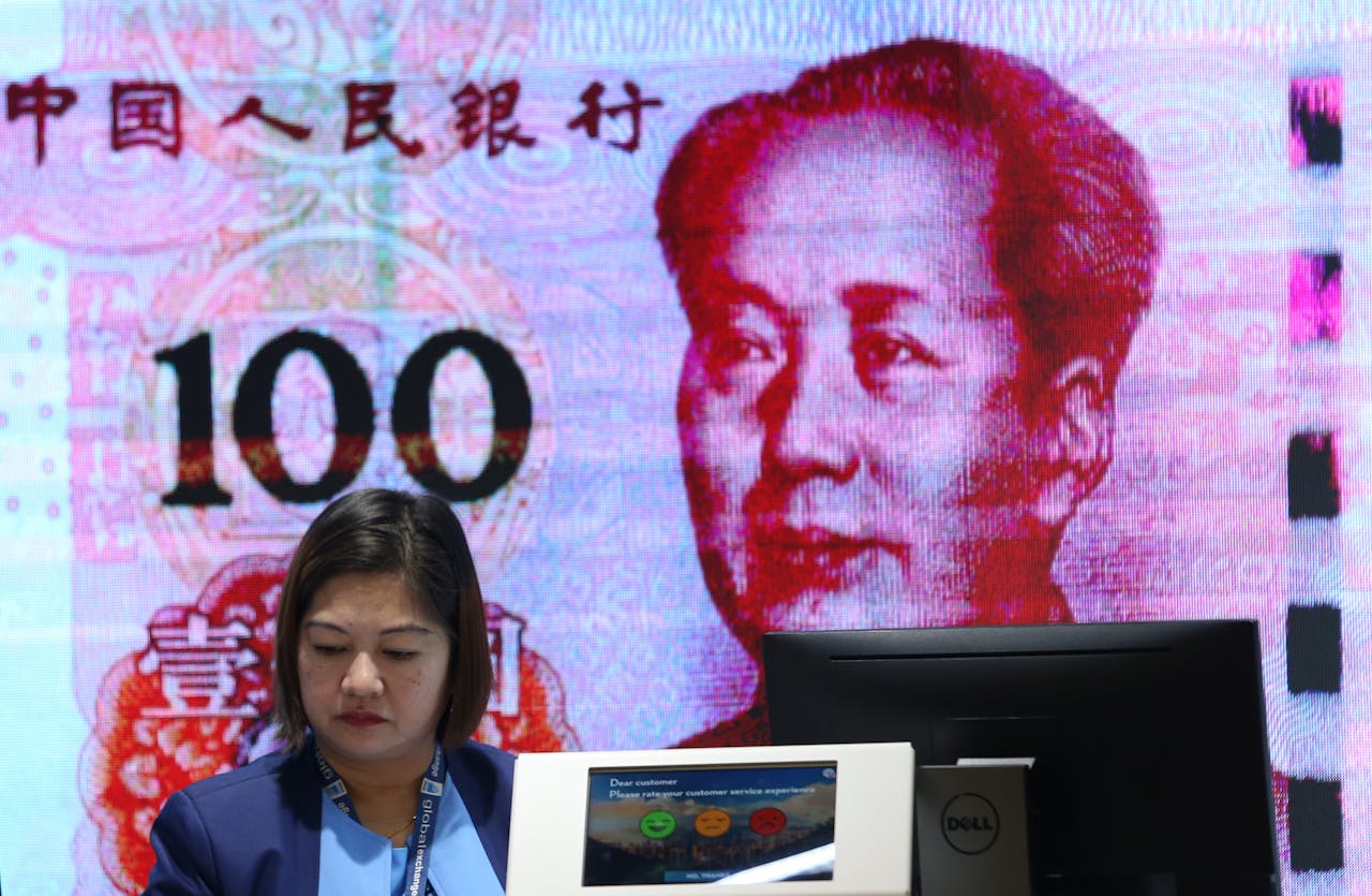 金融海嘯後中國貨幣的擴張，使中國可擴大海外投資進佔海外，但同時在內地製造出泡沫式的金融隱患。（亞新社）
