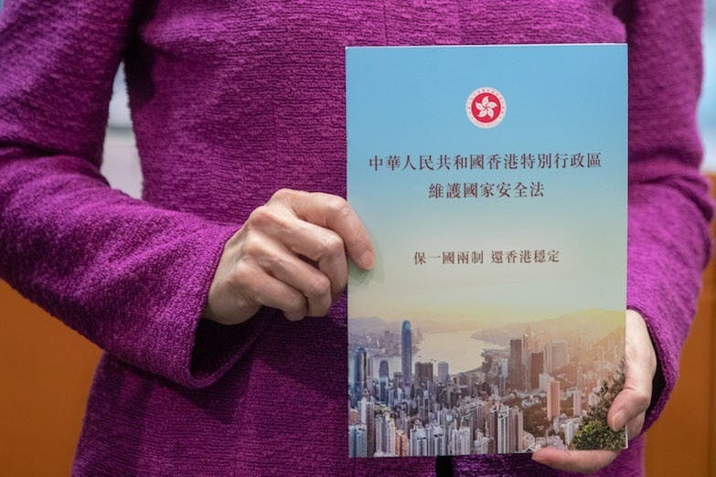 用中國法律語言來說，《基本法》是「上位法」，《國安法》是「下位法」。（亞新社）