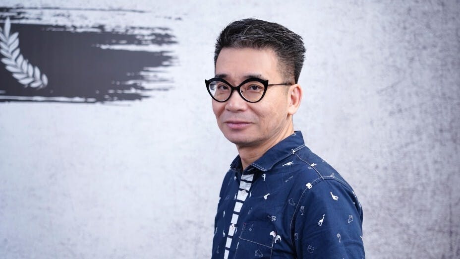 Chris和我一樣，是熱血「搖筆桿」青年。（作者提供）