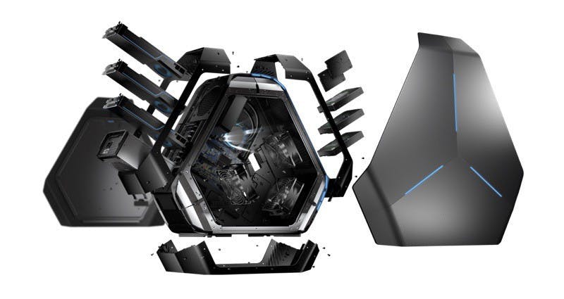 Alienware Area-51 (codename Centauri) desktop gaming computer on a black background shown broken into pieces, panels removed and component parts revealed.