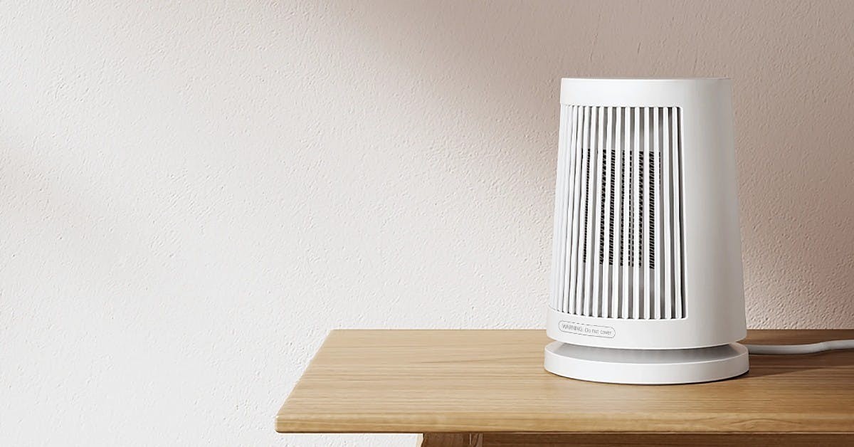 手指冰冷打字受不了 擺台小米桌面暖風機剛好 瞬間加熱45度廣角暖風很舒適