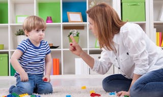 Angry mother scolding a disobedient child
