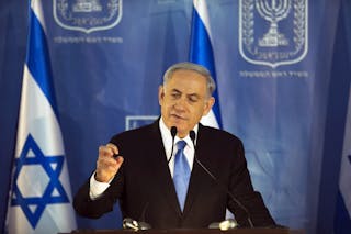 Israel's Prime Minister Netanyahu speaks during a handover ceremony at the prime minister's office in Jerusalem