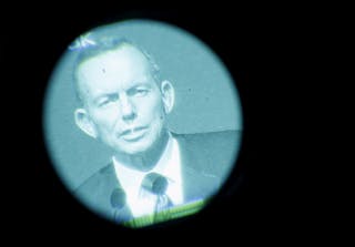 Australia's Prime Minister Tony Abbott delivers a lecture on "Our Common Challenges: Strengthening Security in the Region" in Si