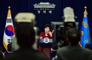 South Korean President Park Geun-Hye speaks during her New Year news conference at the presidential Blue House in Seoul