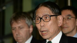 爭議聲中卸任——梁智鴻 爭議聲中卸任——梁智鴻