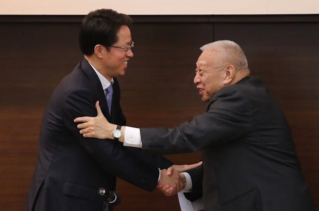 北京視香港為資本主義社會和經濟城市，實行商人治港，使得一國兩制的設計雖是旨在「維持現狀」。（亞新社）