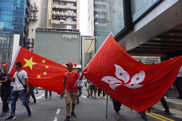 香港就像一個電源轉換插頭，一頭連着內地，一頭連着西方世界。（亞新社）