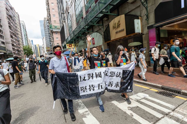 中央既憂人心未回歸，更覺港式民主失控。（亞新社）