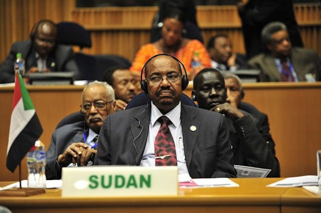Omar Hassan Ahmad al-Bashir, the president of Sudan, listens to a speech during the opening of the 20th session of The New Partnership for Africa&#039;s Development in Addis Ababa, Ethiopia, Jan. 31, 2009. The partnership&#039;s primary objective is to eradicate poverty in Africa and bring long-term and sustainable political, economic, and social change to the continent. (U.S. Navy photo by Mass Communication Specialist 2nd Class Jesse B. Awalt/Released)