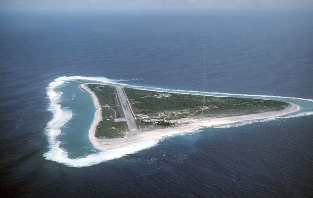 Aerial view of Marcus Island and the runway which supports the US Coast Guard station located there.  Marcus Island is the southernmost island in the Japanese chain.