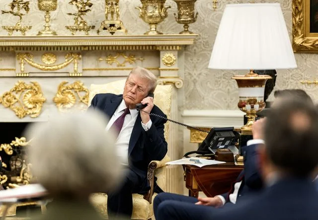 President Donald Trump leads a trilateral phone call with Israeli Prime Minister Benjamin Netanyahu and Qatari Prime Minister Mohammed bin Abdulrahman bin Jassim Al Thani discussing the U.S. peace plan for Gaza, Monday, September 29, 2025, in the Oval Office. (Official White House Photo by Daniel Torok)