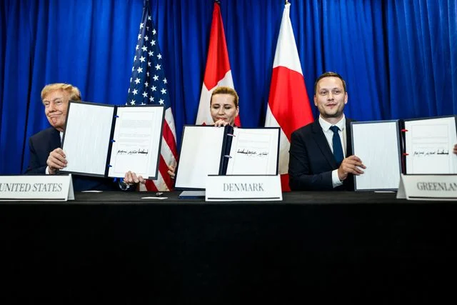 President Donald J. Trump participates in a trilateral signing ceremony with Prime Minister Mette Frederiksen of Denmark and Prime Minister Jans-Frederik Nielsen of Greenland, Tuesday, September 22, 2026, at United Nations Headquarters in New York City. (Official White House Photo by Daniel Torok)